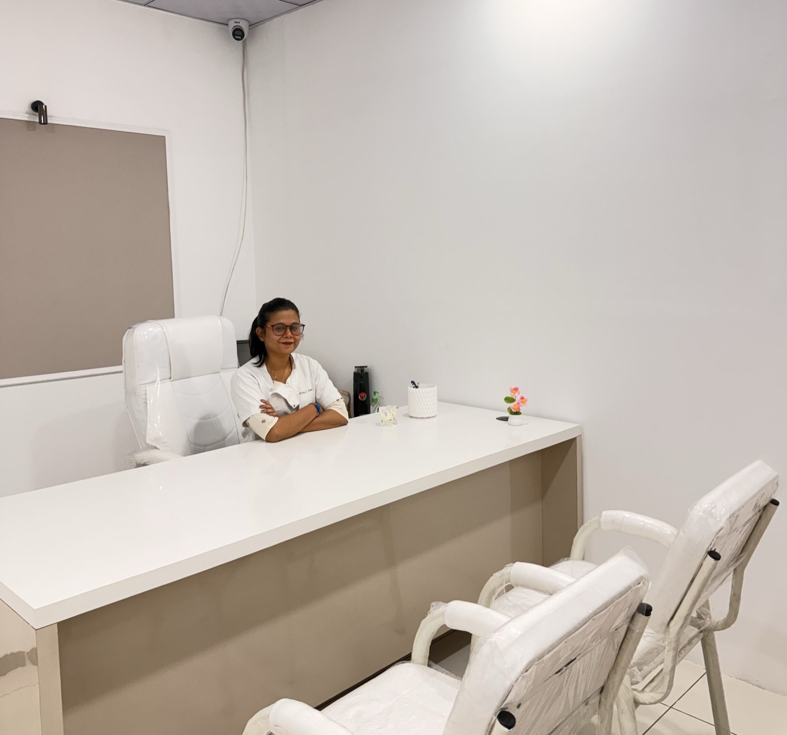 Dr. Anjali at the consultation desk